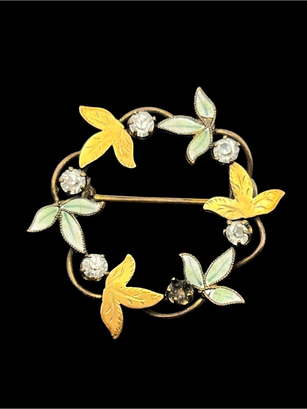 Antique gold tone leaves rhinestone & enamel round wreath brooch pin vintage